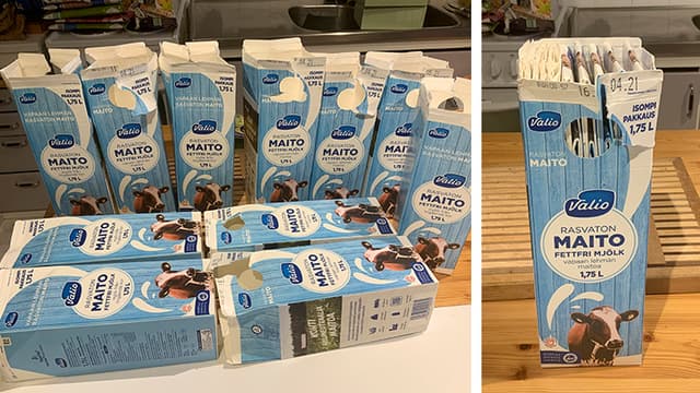 10 maitokartonkia ensin pöydällä erikseen ja sitten sisäkkäin aseteltuna