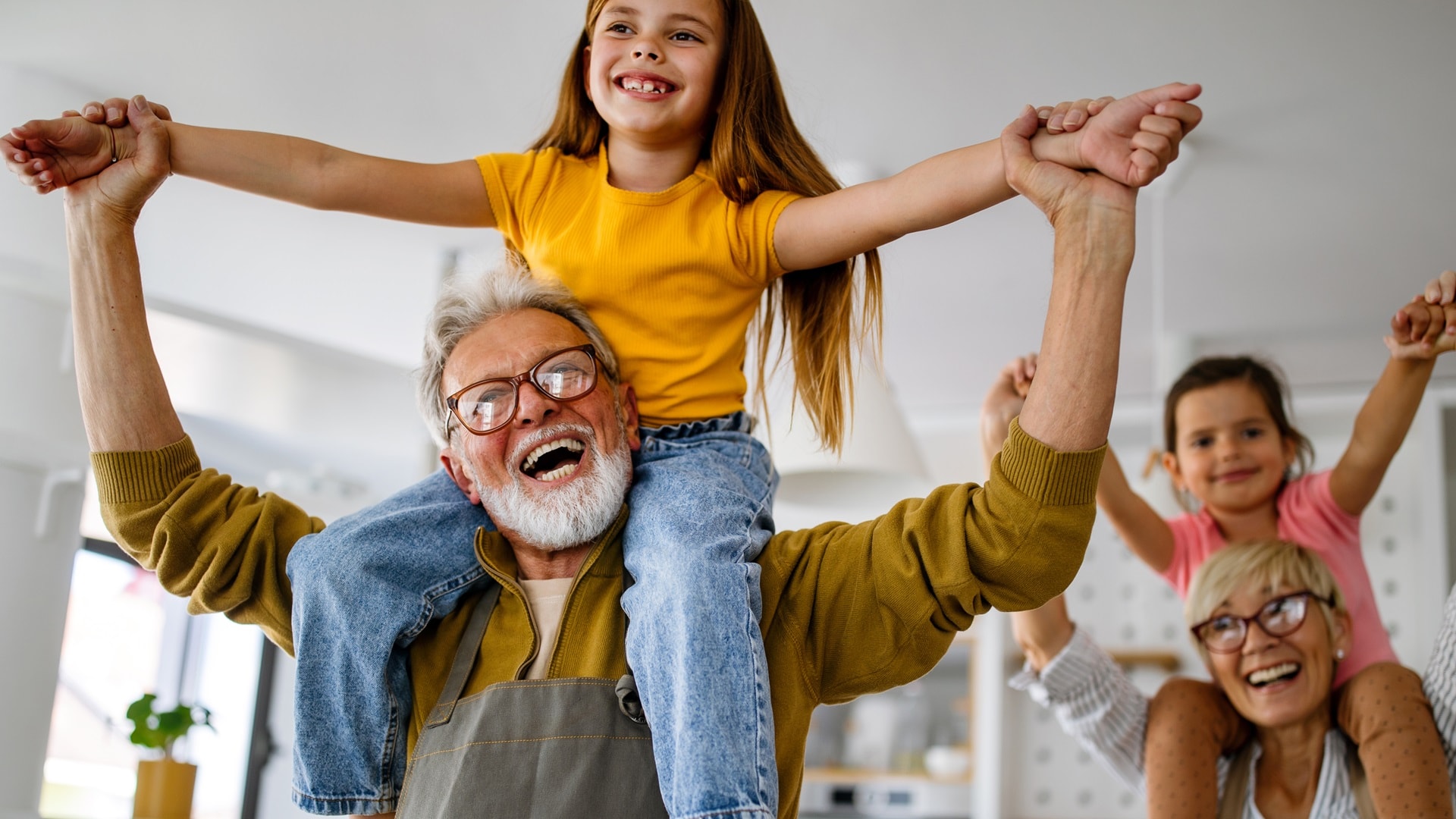happy-grandparents-having-fun-times-with-children-2023-11-27-05-32-25-utc